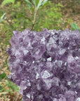 Video shows an amethyst cluster, purple in colour. and weighing 2.45kg.