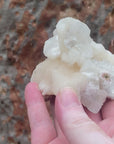 Video shows a specimen piece of Stilbite and Apophylite.