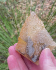 Video shows a piece of honey coloured dogtooth calcite. H 8cm W 6.5cm D 4cm