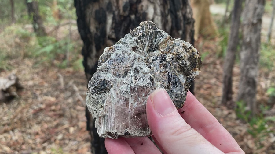 Video of mica and biotite. Silver/grey in colour with a lovely lustre. 