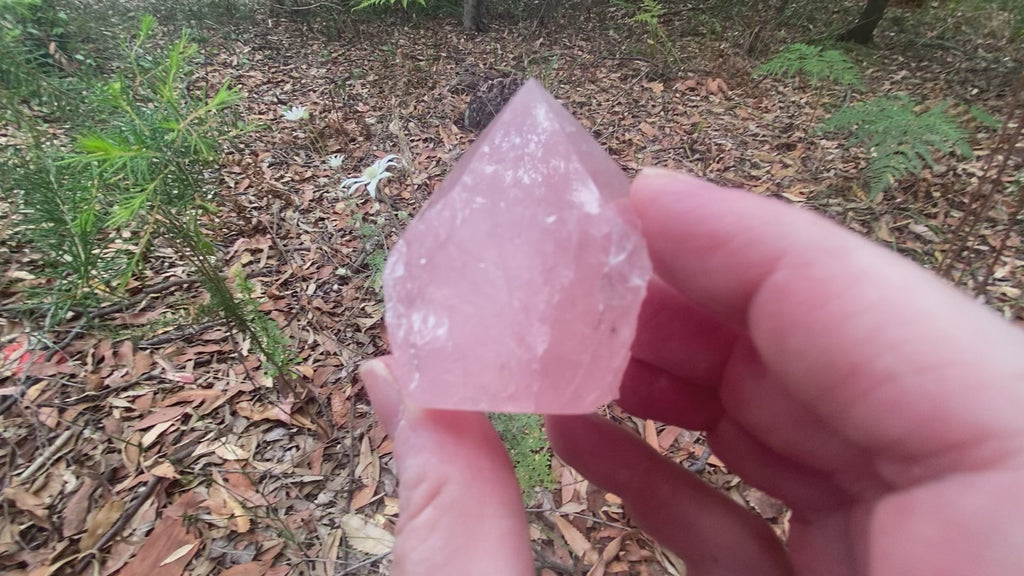 Video shows a top polished Rose Quartz crystal. Soft pink in colour with a translucent gemmy quality. 