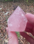 Video shows a top polished Rose Quartz crystal. Soft pink in colour with a translucent gemmy quality. 