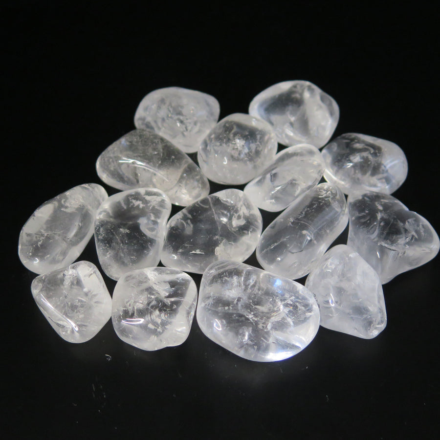 Image shows A grade clear quartz tumble stones. 