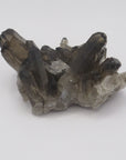 Image shows a smokey quartz cluster with very little matrix. It is blackish to dark grey in colour with translucent crystals. 